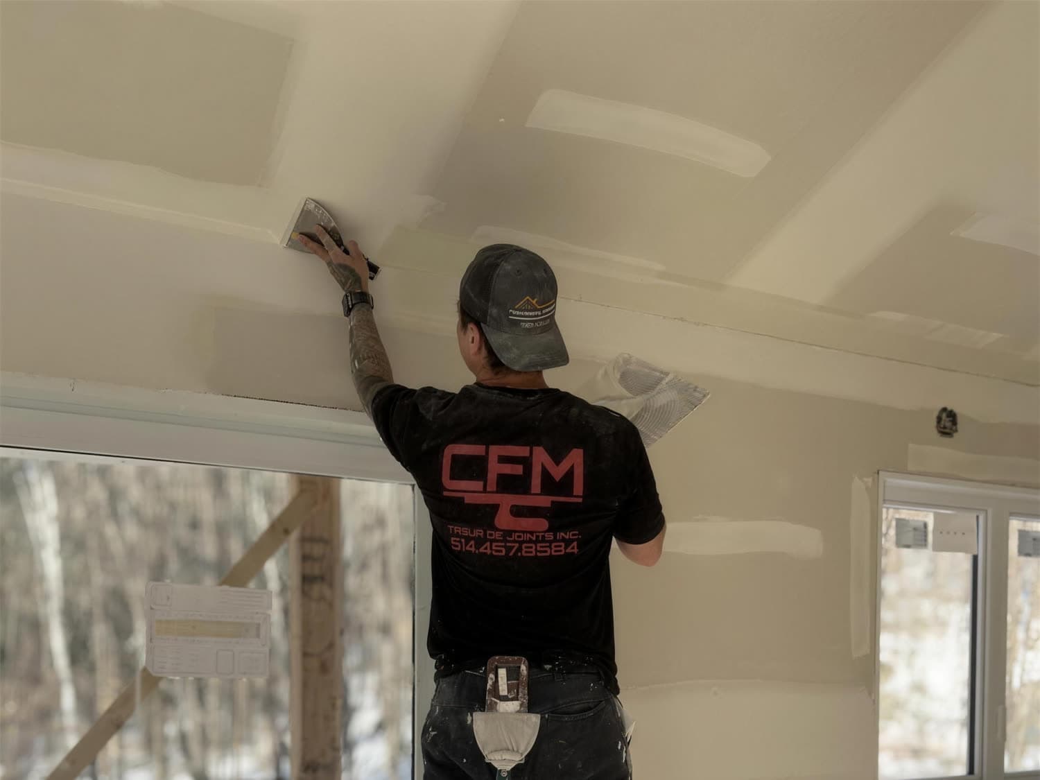 Chantier CFM, finition de gypse